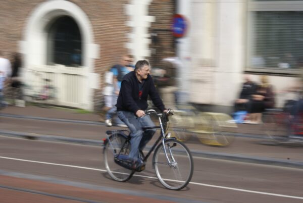 Fietser op het Koningsplein, Amsterdam.